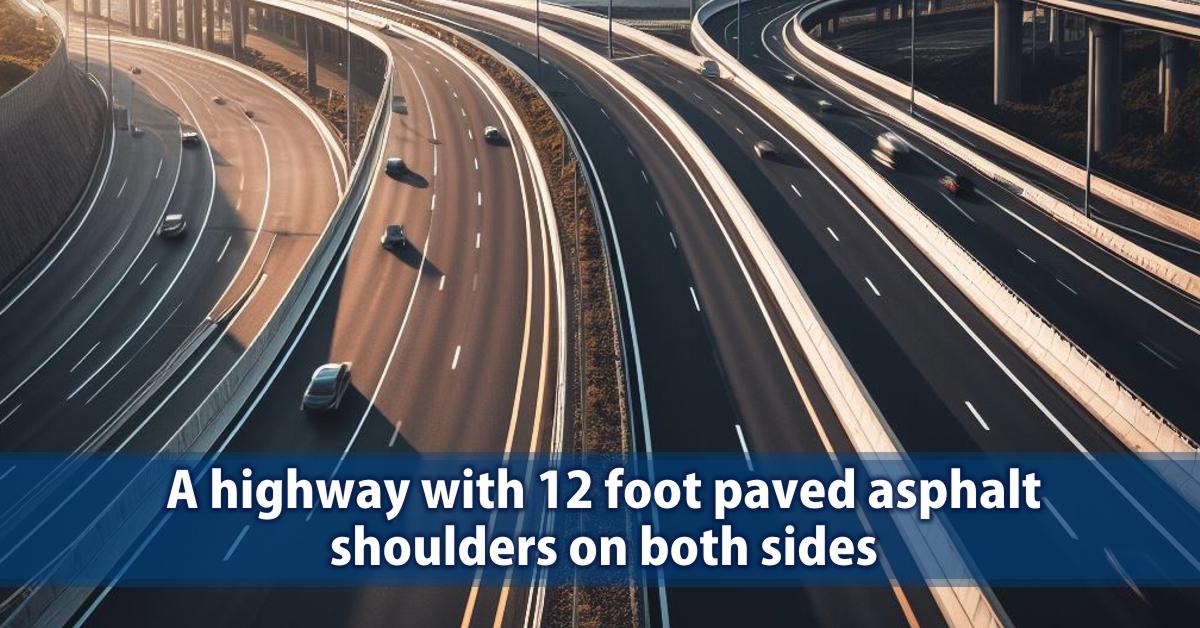 A highway with 12 foot paved asphalt shoulders on both sides